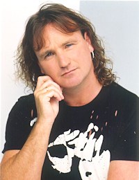 Photo of Mick McConnell wearing a black t-shirt
